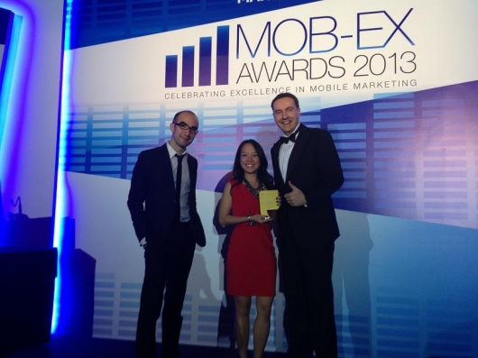 Steve Melhuish (far right), CEO of PropertyGuru Group, collecting the Gold Award for Best Mobile App By a Media Owner at the inaugural Mob-Ex Awards